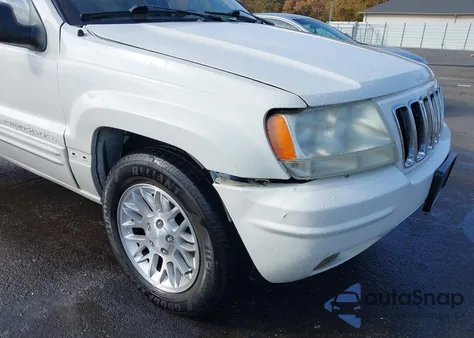 2002 Jeep Grand Cherokee Limited из США, поврежденный, VIN 1J4GX58N72C203308